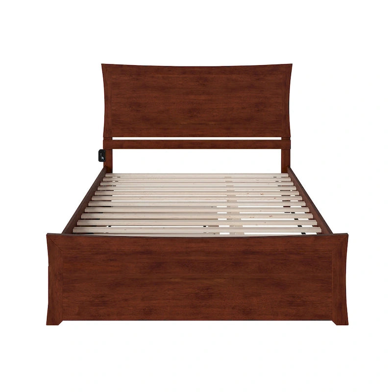 Letto a piattaforma in legno massiccio con pediera e letto estraibile abbinati