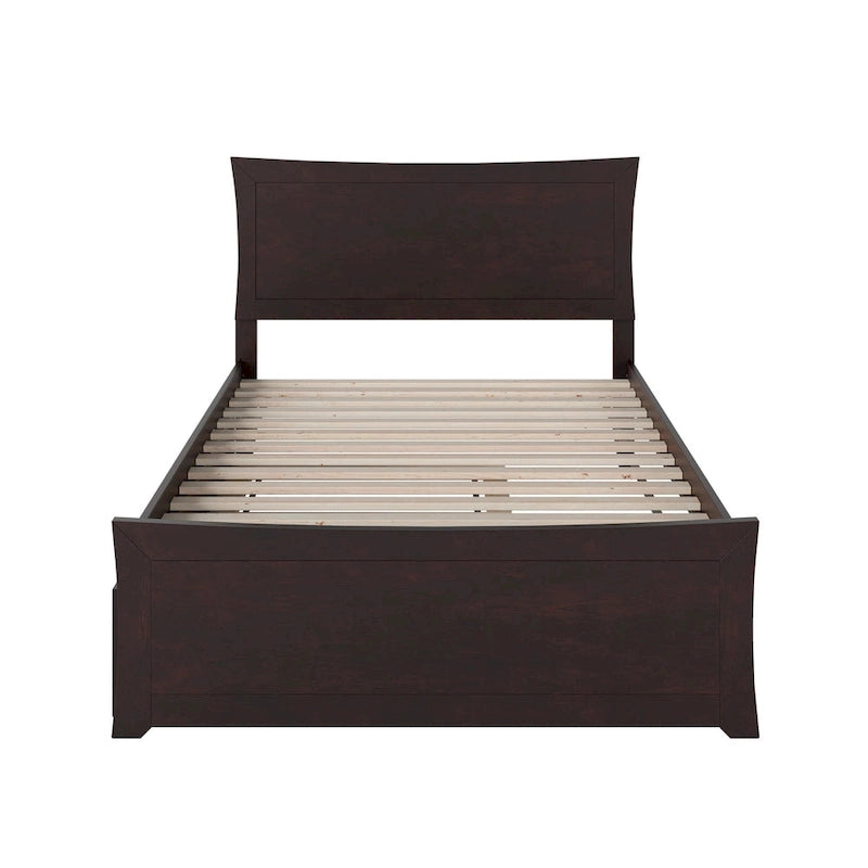 Letto a piattaforma in legno massiccio con pediera e letto estraibile abbinati