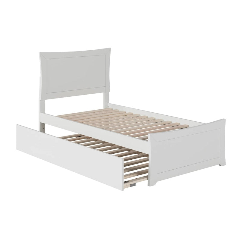 Letto a piattaforma in legno massiccio con pediera e letto estraibile abbinati