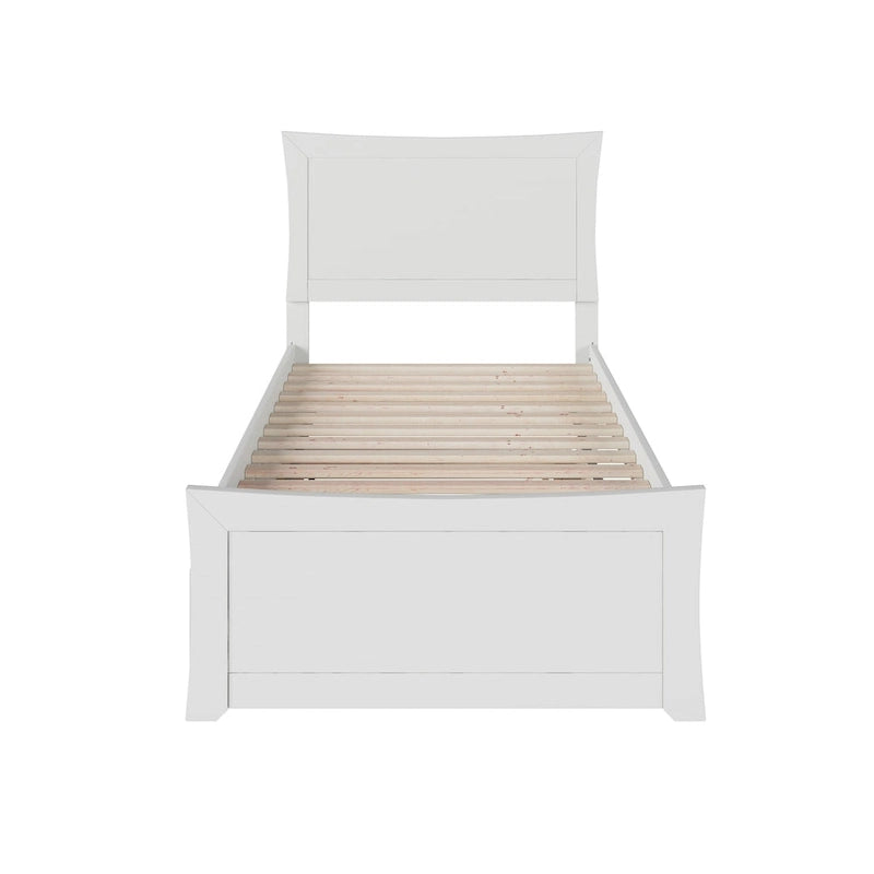Letto a piattaforma in legno massiccio con pediera e letto estraibile abbinati