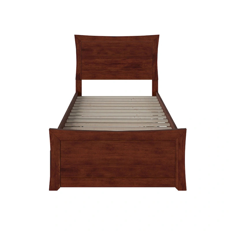 Letto a piattaforma in legno massiccio con pediera e letto estraibile abbinati
