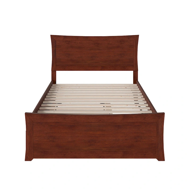 Letto a piattaforma in legno massiccio con pediera e letto estraibile abbinati